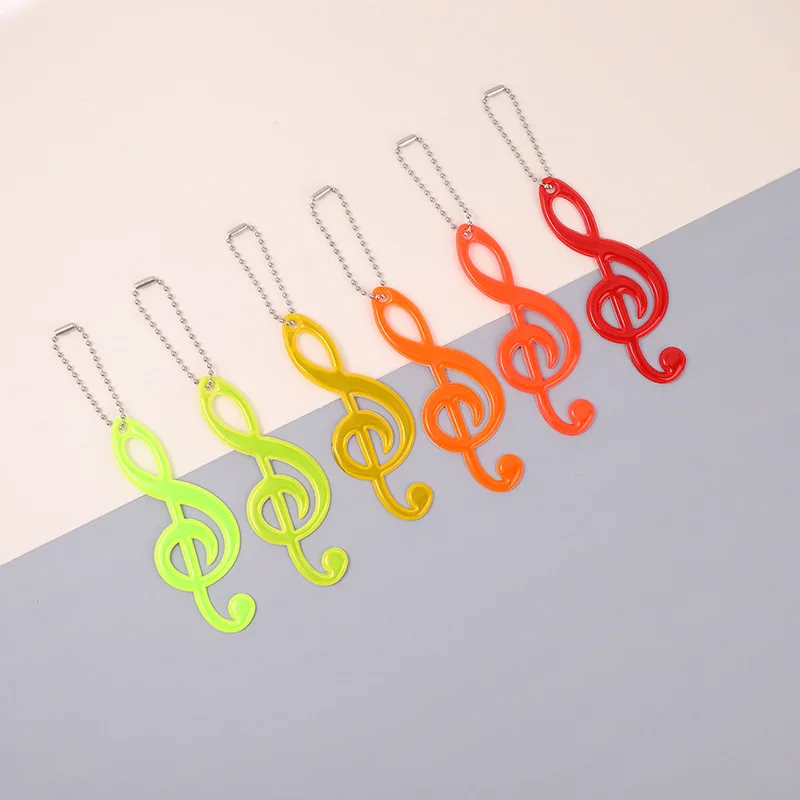 2Pcs Color Music Note PVC Reflective Pendant Kids Schoolbag Keychain Charm Night Running Cycling Luminous Warning Tag in Dark