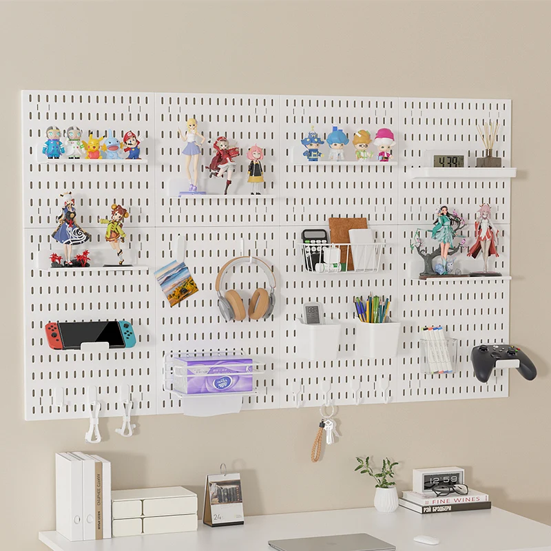 Wall-mounted gaming pegboard shelf with hooks and display stands. Plastic, ideal for office storage.
